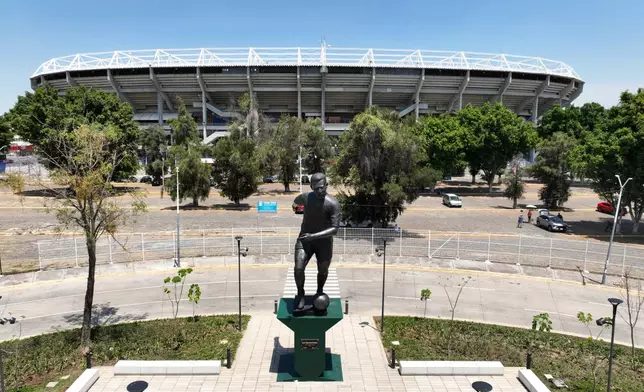 A statue of Brazilian soccer player Pele stands after its unveiling outside Jalisco Stadium in Guadalajara, Mexico, Thursday, May 21, 2026. (AP Photo/Refugio Ruiz)