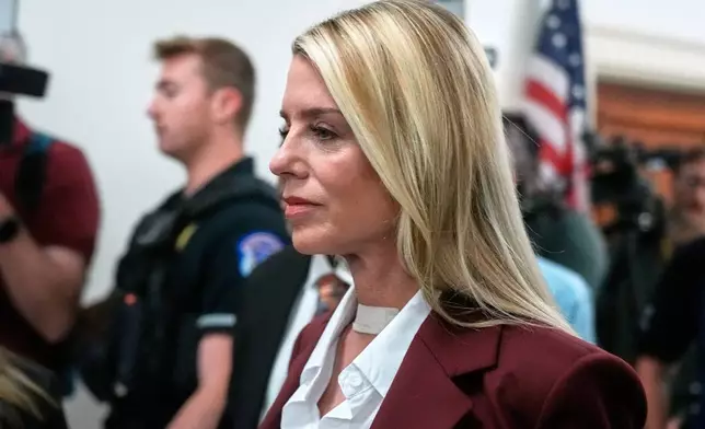 Former Attorney General Pam Bondi arrives for her deposition at the Rayburn House Office Building on Capitol Hill, Friday, May 29, 2026, in Washington. (AP Photo/Manuel Ceneta)