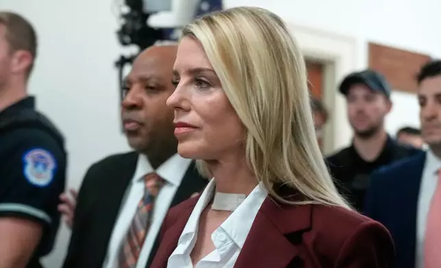 Former Attorney General Pam Bondi arrives for her deposition at the Rayburn House Office Building on Capitol Hill, Friday, May 29, 2026, in Washington. (AP Photo/Manuel Ceneta)