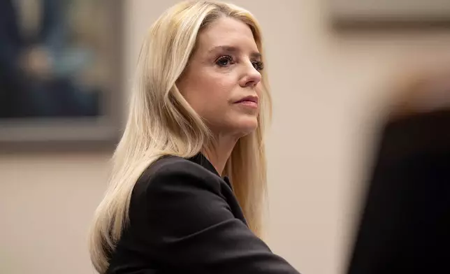 FILE - Attorney General Pam Bondi faces questions in the House Judiciary Committee over the Justice Department's handling of files related to convicted sex offender Jeffrey Epstein, at the Capitol in Washington, Feb. 11, 2026. (AP Photo/J. Scott Applewhite, File)