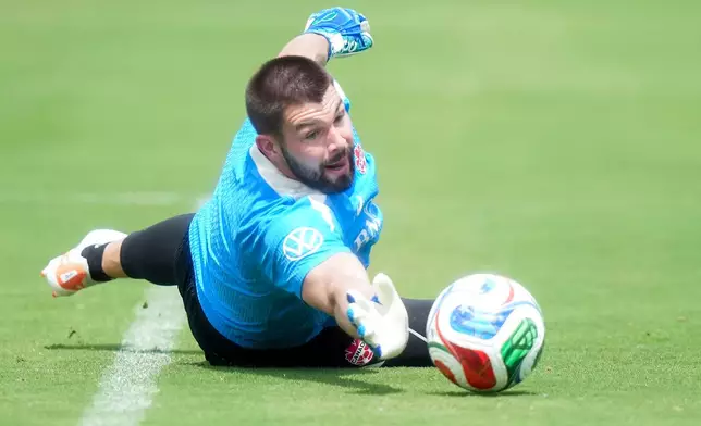 Canada goalkeeper Maxime Crépeau makes a save during the selection camp for Canada’s national soccer team, Thursday, May 28, 2026, in Charlotte, N.C., ahead of the FIFA World Cup soccer tournament. (Nathan Denette/The Canadian Press via AP)