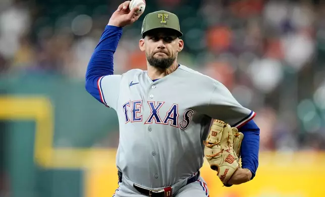 Texas Rangers starting pitcher Nathan Eovaldi throws against the Houston Astros during the first inning of a baseball game, Sunday, May 17, 2026, in Houston. (AP Photo/Eric Christian Smith)