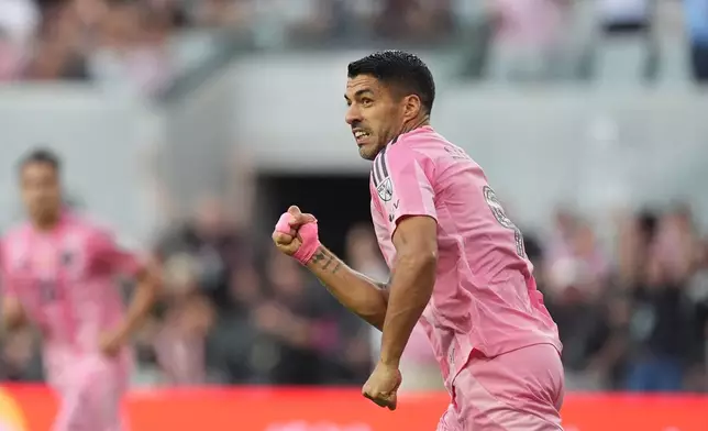 Inter Miami forward Luis Suárez celebrates after scoring his side's second goal during the first half of an MLS soccer match against Philadelphia Union, Sunday, May 24, 2026, in Miami. (AP Photo/Rebecca Blackwell)