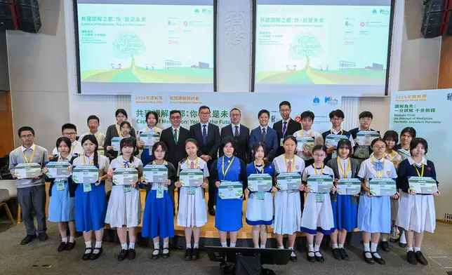 Mediation Week 2026, organised by the Department of Justice, was officially launched today (May 4). The opening of Mediation Week was marked by the thematic event: School Mediation Seminar this morning. Photo shows the Secretary for Justice, Mr Paul Lam, SC (back row, centre), and the Law Officer (Civil Law), Mr Clifford Tavares (back row, fifth right), with winners of the Mediation Essay Competition 2026. Source: HKSAR Government Press Releases