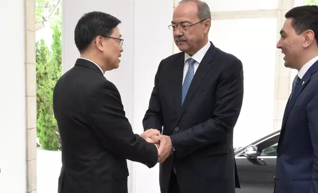 The Chief Executive, Mr John Lee (left), meets with the visiting Prime Minister of Uzbekistan, Mr Abdulla Nigmatovich Aripov (centre), at Government House today (May 6). Source: HKSAR Government Press Releases