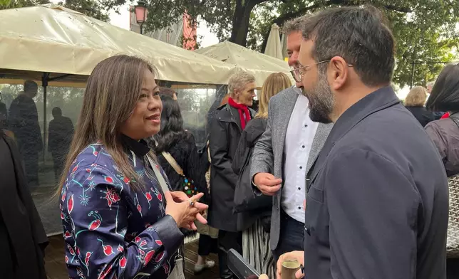 The Secretary for Culture, Sports and Tourism, Miss Rosanna Law, began her visit to Venice, Italy. Photo shows Miss Law (left) attending a reception hosted by Art Basel on May 6 (Venice time). Source: HKSAR Government Press Releases