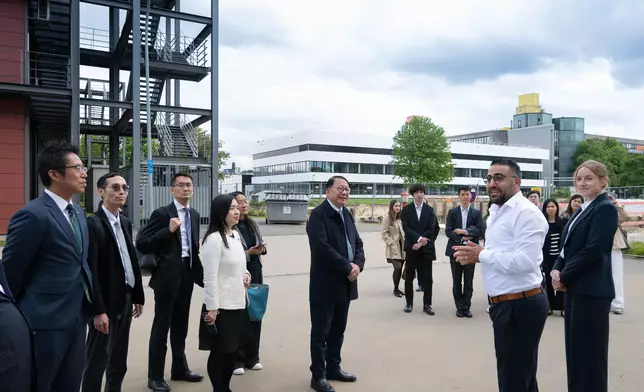 ​The Chief Secretary for Administration, Mr Chan Kwok-ki, led a delegation of the Working Group on Planning and Construction of the University Town under the Committee on Development of the Northern Metropolis to commence a visit to Germany yesterday (May 18, Aachen time). Photo shows Mr Chan (front row, third right), and the delegation visiting RWTH Aachen University, and touring its production technology institute WZL. Source: HKSAR Government Press Releases