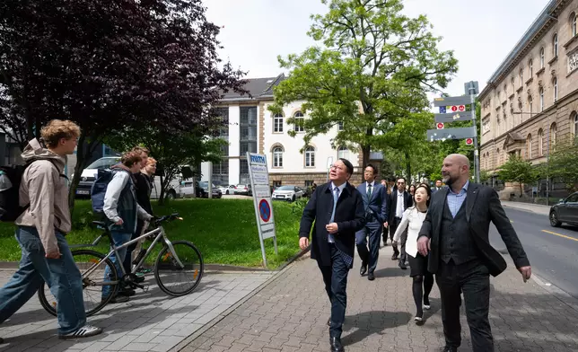 ​The Chief Secretary for Administration, Mr Chan Kwok-ki, led a delegation of the Working Group on Planning and Construction of the University Town under the Committee on Development of the Northern Metropolis to commence a visit to Germany yesterday (May 18, Aachen time). Photo shows Mr Chan (front row, first left), and the delegation visiting RWTH Aachen University, and touring the facilities of the campus. Source: HKSAR Government Press Releases