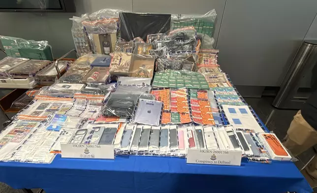 The Hong Kong Police Force (HKPF), in collaboration with the Police forces from nine countries and regions, conducted a joint operation through the Cross-Border Anti-Scam Collaboration Platform “FRONTIER+” from March 10 to May 7. Photo shows exhibits seized by personnel of the HKPF in the joint operation. Source: HKSAR Government Press Releases