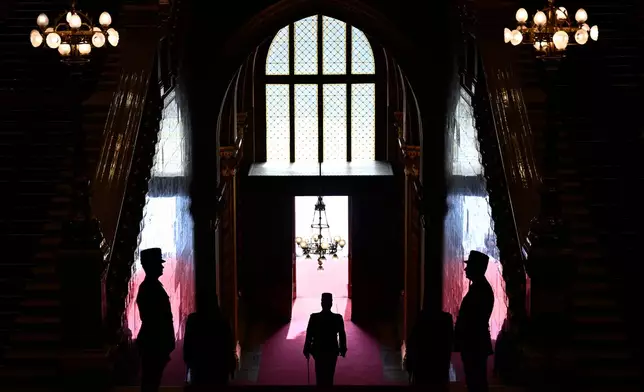 Members of the Hungarian parliament guard wait in the morning before the inauguration ceremony of Prime Minister Peter Magyar in Budapest, Hungary, Saturday, May 9, 2026. (AP Photo/Denes Erdos)