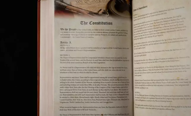 FILE - The Constitution of the United States is printed in Republican presidential nominee former President Donald Trump's "God Bless the USA" Bible in Washington, Oct. 8, 2024. (AP Photo/Ben Curtis, File)