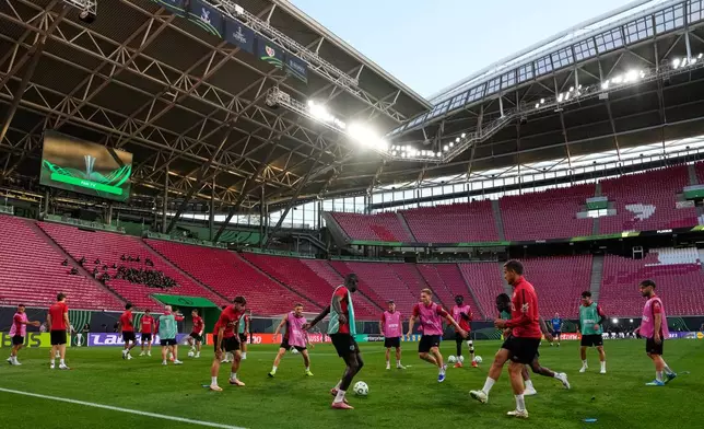 Rayo's players work out during a training session ahead of the Europa Conference League final soccer match between Crystal Palace and Rayo Vallecano in Leipzig, Germany, Tuesday, May 26, 2026. (AP Photo/Michael Probst)
