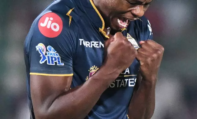 Gujarat Titans' Kagiso Rabada celebrate the wicket of Rajasthan Royals' Yashasvi Jaiswal during the Indian Premier League cricket match between Rajasthan Royals and Gujarat Titans in Jaipur, India, Saturday, May 9, 2026. (AP Photo/ Str)