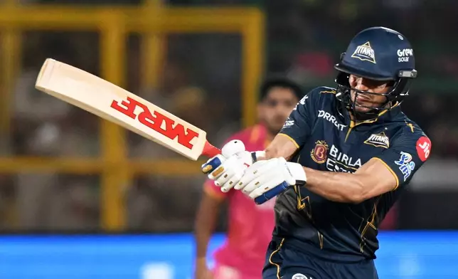 Gujarat Titans' captain Shubman Gill plays a shot during the Indian Premier League cricket match between Rajasthan Royals and Gujarat Titans in Jaipur, India, Saturday, May 9, 2026. (AP Photo/ Str)