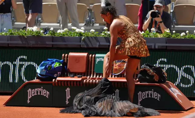 Naomi Osaka of Japan prepares for the first round women's singles tennis match against Laura Siegemund of Germany at the French Open tennis tournament in Paris, Tuesday, May 26, 2026. (AP Photo/Aurelien Morissard)