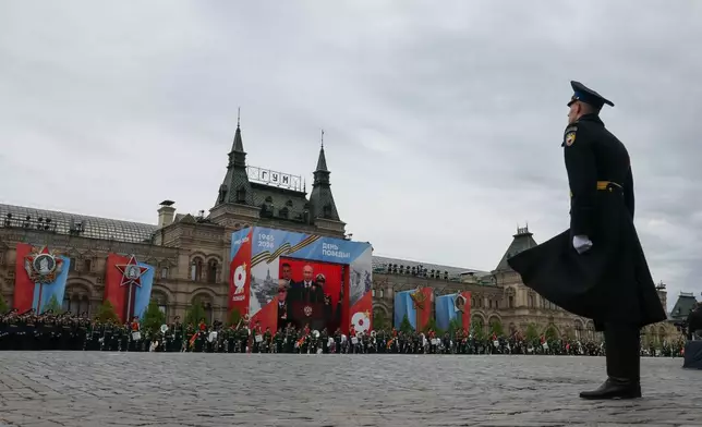 Russian President Vladimir Putin is seen on a screen while delivering a speech during the Victory Day military parade in Moscow, Saturday, May 9, 2026, during celebrations of the 81st anniversary of the Soviet Union's victory over Nazi Germany during the World War II. (Shamil Zhumatov/Pool Photo via AP)