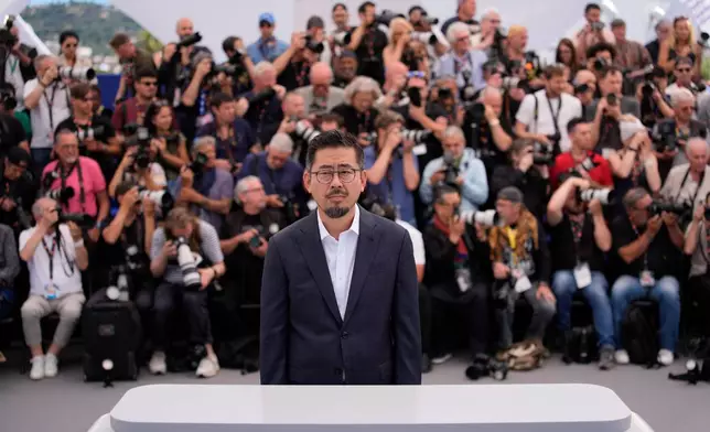 Director Na Hong-jin poses for photographers at the photo call for the film 'Hope' during the 79th international film festival, Cannes, southern France, Monday, May 18, 2026. (AP Photo/John Locher)