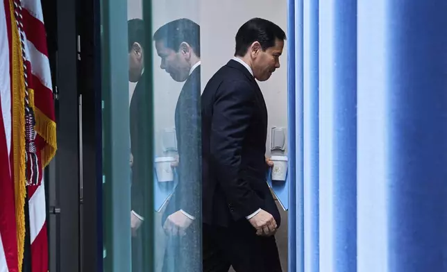 Secretary of State Marco Rubio leaves the room after speaking to the media in the James Brady Press Briefing Room of the White House, Tuesday, May 5, 2026, in Washington. (AP Photo/Jacquelyn Martin)