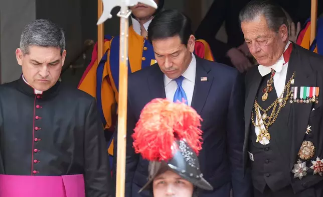 US Secretary of State Marco Rubio leaves the St. Damasus courtyard after meeting with Pope Leo XIV and Vatican Secretary of State Pietro Parolin the Vatican, Thursday, May 7, 2026. (AP Photo/Andrew Medichini, Pool)