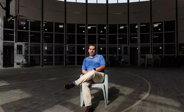 Stacy Roberts, superintendent of the Mary Dickerson Juvenile Justice Center, poses in the commons area, Feb. 24, 2026, at the Juvenile Justice Center in Camdenton, Mo. (AP Photo/Austin Johnson)