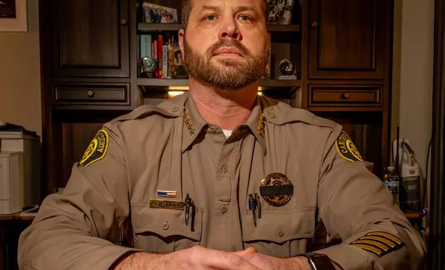 Sheriff Chris Edgar poses for a portrait on Feb. 24, 2026, in his office at the Camden County Sheriffs Department in Camdenton, Mo. (AP Photo/Austin Johnson)