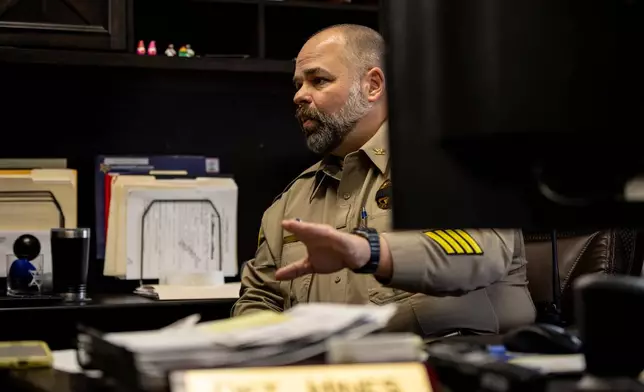 Detective Scott Hines responds to questions regarding the Calo Programs Residential Treatment Center on Feb. 24, 2026, in his office at the Camden County Sheriffs Department in Camdenton, Mo. (AP Photo/Austin Johnson)