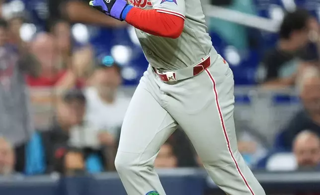 Philadelphia Phillies' Bryce Harper runs the bases after hitting a home run during the third inning of a baseball game against the Miami Marlins, Monday, May 4, 2026, in Miami. (AP Photo/Rebecca Blackwell)