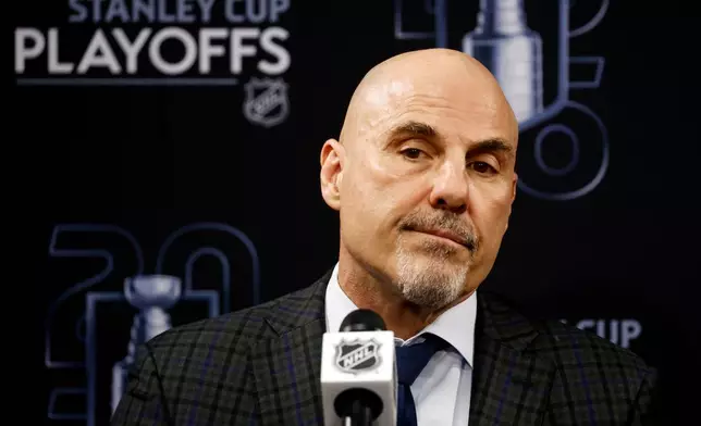 Philadelphia Flyers head coach Rick Tocchet speaks at a news conference following Game 2 of an NHL hockey Stanley Cup second-round playoff series against the Carolina Hurricanes in Raleigh, N.C., Monday, May 4, 2026. (AP Photo/Karl DeBlaker)