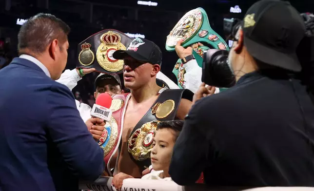 David Benavidez talks to media after his victory over Gilberto Ramirez, not pictured, in a cruiserweight championship boxing match Saturday, May 2, 2026, in Las Vegas. (AP Photo/Ian Maule)