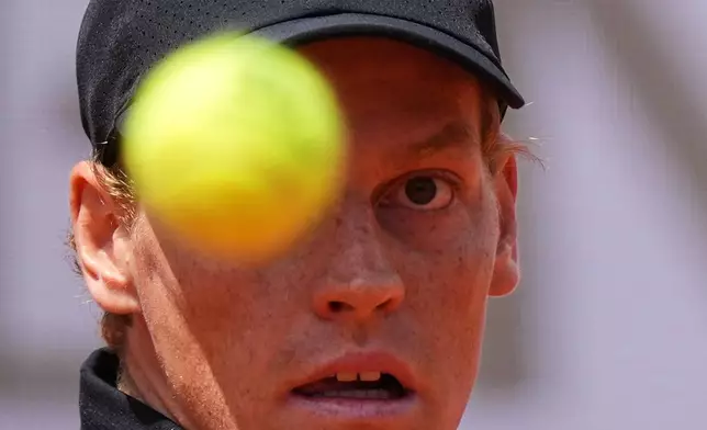Italy's Jannik Sinner eyes the ball as he plays Andrey Rublev, during their match at the Italian Open tennis tournament in Rome, Thursday, May 14, 2026. (AP Photo/Andrew Medichini)