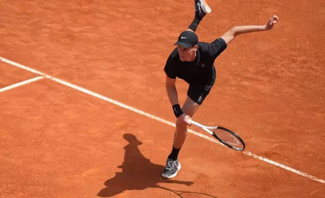 Italy's Jannik Sinner serves a ball to Andrey Rublev, during their match at the Italian Open tennis tournament in Rome, Thursday, May 14, 2026. (AP Photo/Andrew Medichini)