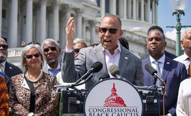 House Minority Leader Hakeem Jeffries, D-N.Y., and members of the Congressional Black Caucus speak outside the Capitol in Washington, Tuesday, May 19, 2026. (AP Photo/J. Scott Applewhite)