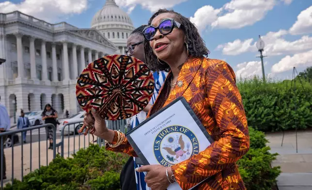 Rep. Yvette Clarke, D-N.Y., chair of the Congressional Black Caucus, prepares for a news conference at the Capitol in Washington, Tuesday, May 19, 2026. (AP Photo/J. Scott Applewhite)