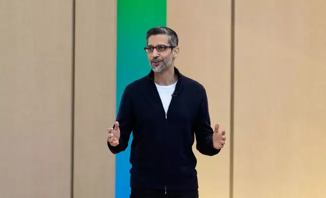 Alphabet CEO Sundar Pichai speaks at a Google I/O event in Mountain View, Calif., Tuesday, May 19, 2026. (AP Photo/Jeff Chiu)
