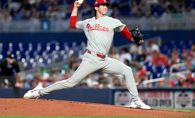 Philadelphia Phillies pitcher Andrew Painter pitches during the first inning of a baseball game against the Miami Marlins, Saturday, May 2, 2026, in Miami. (AP Photo/Michael Laughlin)