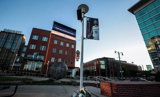 Flowers and words of support for Memphis Grizzlies forward Brandon Clarke, who died in Los Angeles at the age of 29, are seen at a small memorial outside the FedEx Forum in Memphis, Tenn., Tues., May 12, 2026. (Patrick Lantrip/Daily Memphian via AP)