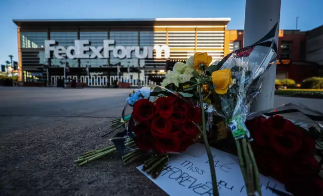Flowers and words of support for Memphis Grizzlies forward Brandon Clarke, who died in Los Angeles at the age of 29, are seen at a small memorial outside the FedEx Forum in Memphis, Tenn., Tues., May 12, 2026. (Patrick Lantrip/Daily Memphian via AP)