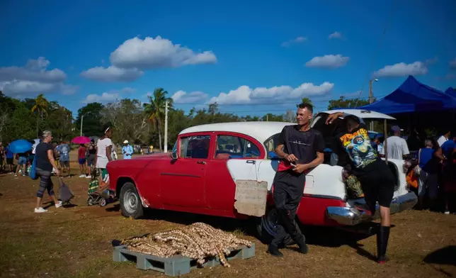 Vendors wait for customers at a weekly food fair in Alamar, Havana province, Cuba, Saturday, May 2, 2026. (AP Photo/Ramon Espinosa)