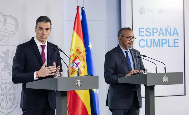 Spain's Prime Minister Pedro Sánchez, left, and Director General of the World Health Organization (WHO) Tedros Adhanom Ghebreyesus attend a press conference at the Moncloa Palace in Madrid, Tuesday, May 12, 2026. (Carlos Luján/Europa Press via AP)