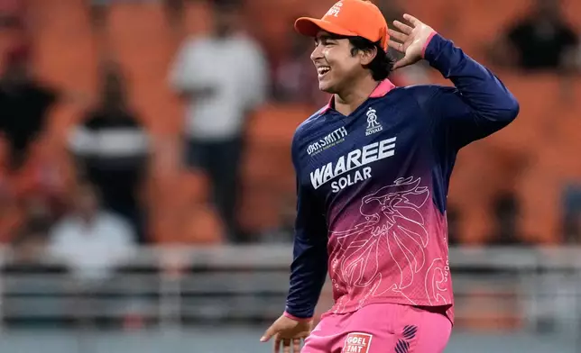Rajasthan Royals' Vaibhav Sooryavanshi shares a light moment during the Indian Premier League cricket match between Rajasthan Royals and Sunrisers Hyderabad in New Chandigarh, India, Wednesday, May 27, 2026. (AP Photo/Ashwini Bhatia)