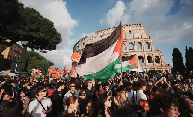 People stage a protest after activists attempting to break Israel's maritime blockade of Gaza say Israeli forces have intercepted their "Global Sumud Flotilla" near the southern Greek island of Crete, in Rome, Thursday, April 30, 2026. (AP Photo/Andrew Medichini)