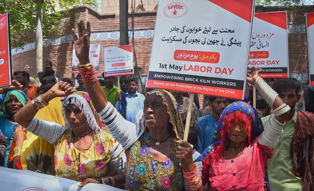 Kiln workers take part in a demonstration to mark May Day in Hyderabad, Pakistan, Friday, May 1, 2026. (AP Photo/Pervez Masih)