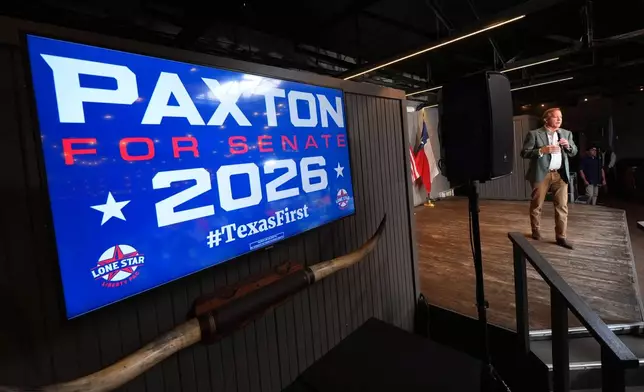 Texas Attorney General Ken Paxton, a Republican candidate for the U.S. Senate, speaks to supporters while campaigning for his primary runoff race Monday, May 18, 2026, in Dallas. (AP Photo/Julio Cortez)
