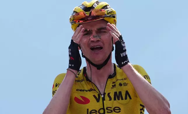 United States' Sepp Kuss of Team Visma | Lease A Bike reacts after winning the 19th stage of the Giro d'Italia cycling race, from Feltre to Alleghe, Italy, Friday, May 29, 2026. (Gian Mattia D'Alberto/LaPresse via AP)