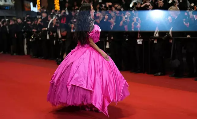 Jury member Demi Moore poses for photographers upon arrival at the premiere of the film 'Paper Tiger' at the 79th international film festival, Cannes, southern France, Saturday, May 16, 2026. (AP Photo/Andreea Alexandru)