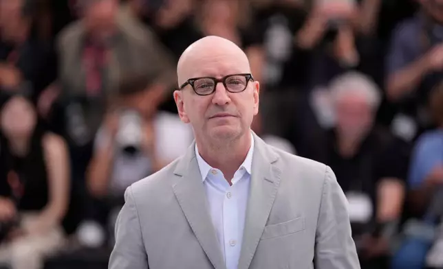 Director Steven Soderbergh poses for photographers at the photo call for the film 'John Lennon: The Last Interview' during the 79th international film festival, Cannes, southern France, Saturday, May 16, 2026. (AP Photo/John Locher)