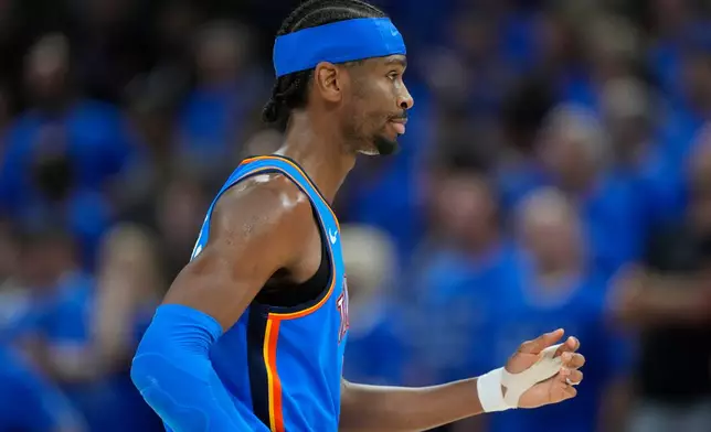Oklahoma City Thunder guard Shai Gilgeous-Alexander walks back to the team bench during the second half of Game 7 of the Western Conference finals of the NBA basketball playoffs against the San Antonio Spurs, series Saturday, May 30, 2026, in Oklahoma City. (AP Photo/Tony Gutierrez)