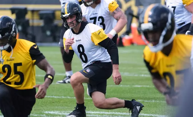 Pittsburgh Steelers quarterback Aaron Rodgers (8) participates in the football team's OTA workout in Pittsburgh, Monday, May 18, 2026. (AP Photo/Gene J. Puskar)