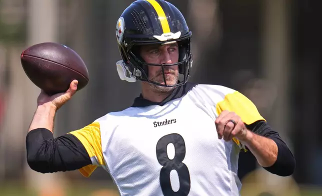 Pittsburgh Steelers quarterback Aaron Rodgers (8) participates in the football team's OTA workout in Pittsburgh, Monday, May 18, 2026. (AP Photo/Gene J. Puskar)