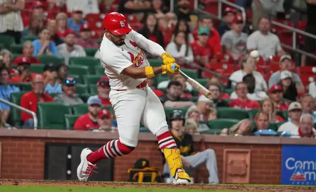 St. Louis Cardinals' Ivan Herrera hits a three-run walk-off home run to defeat the Pittsburgh Pirates in the 10th inning of a baseball game Tuesday, May 19, 2026, in St. Louis. (AP Photo/Jeff Roberson)